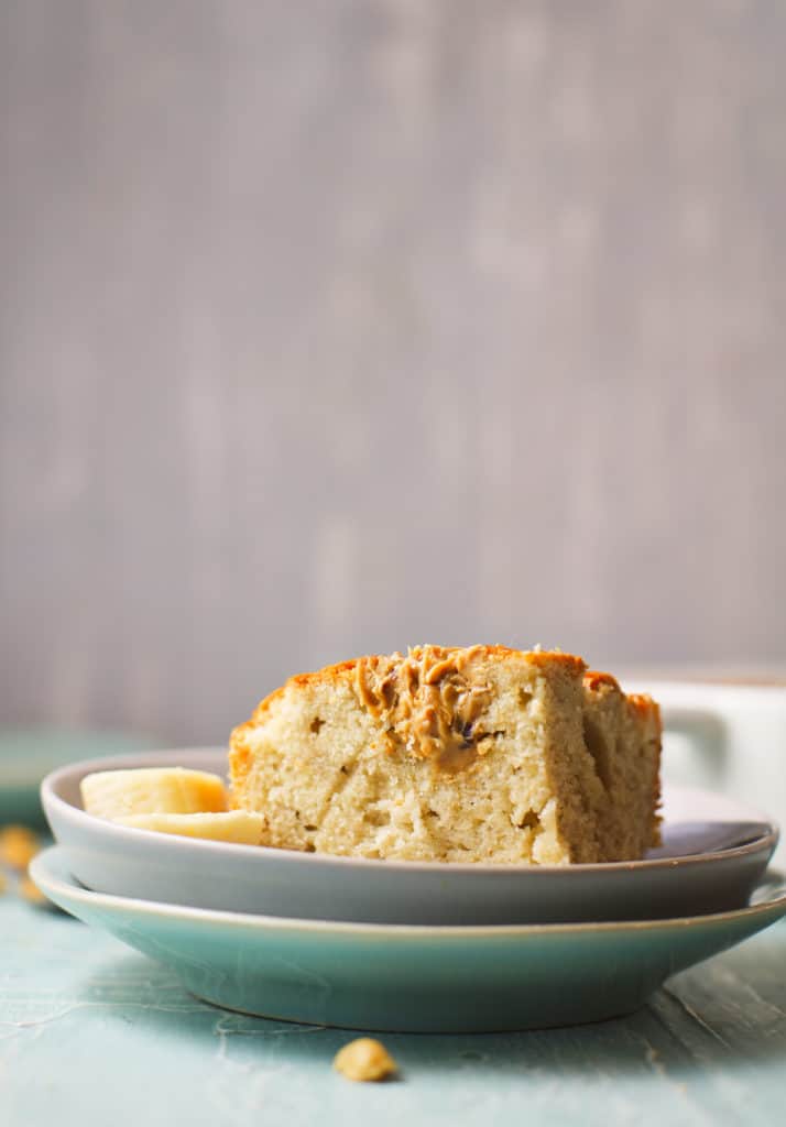 This easy, delicious, and healthy peanut butter banana bread recipe has no refined sugar added! Simple ingredients pack big flavour with this baked treat. Make it for breakfast or a healthy night time snack. #bananabread #healthydessert #healthybaking