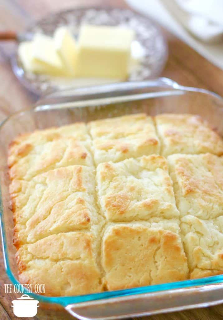 Butter Dip Buttermilk Biscuits recipe, no biscuit cutters, in a square Puree baking dish with sliced butter