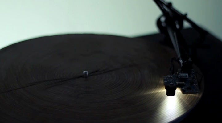 A record player that plays slices of wood 1 A record player that plays slices of wood