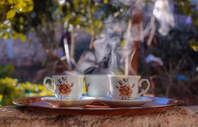 having a cup of black tea with cereal having a cup of black tea with cereal