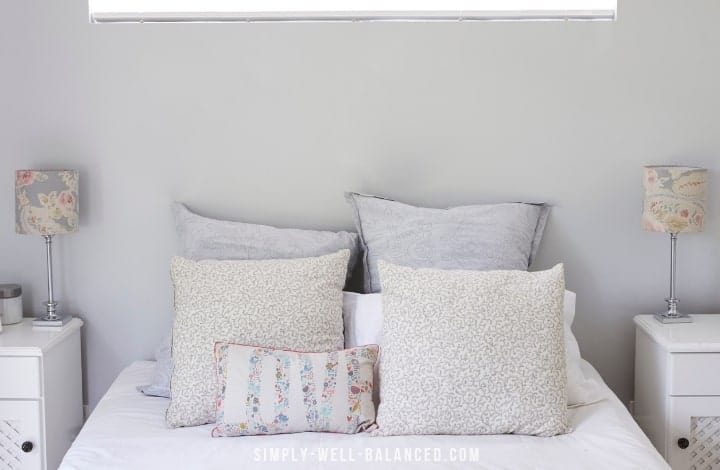 pillows on a bed in a clutter free bedroom