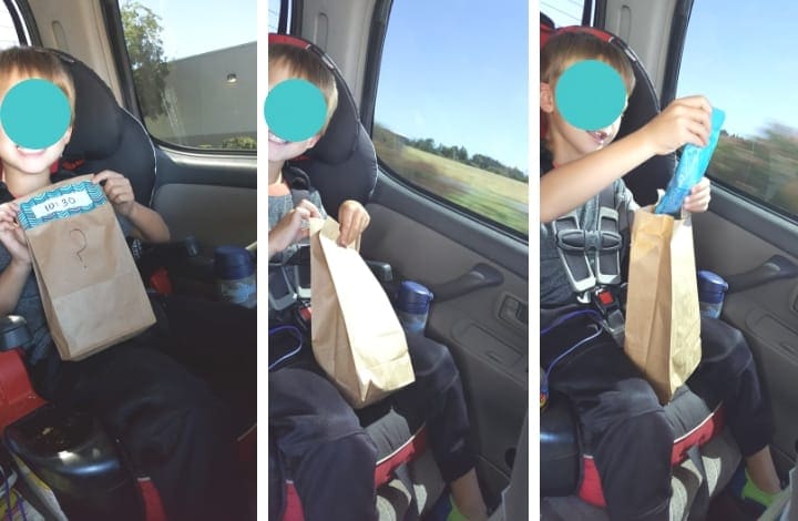 Toddler opening road trip busy bag