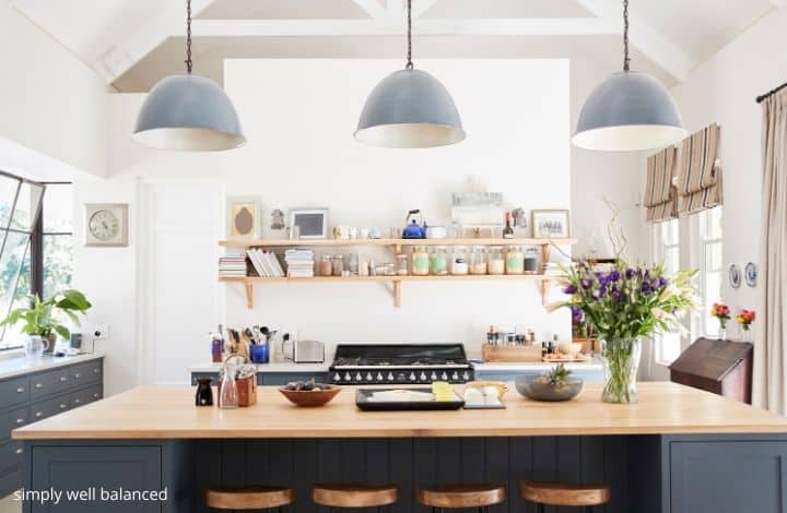 Modern, decluttered kitchen with island.