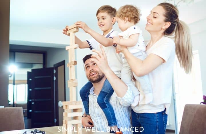 Minimalism with kids: family experiences over things. Family building blocks together.
