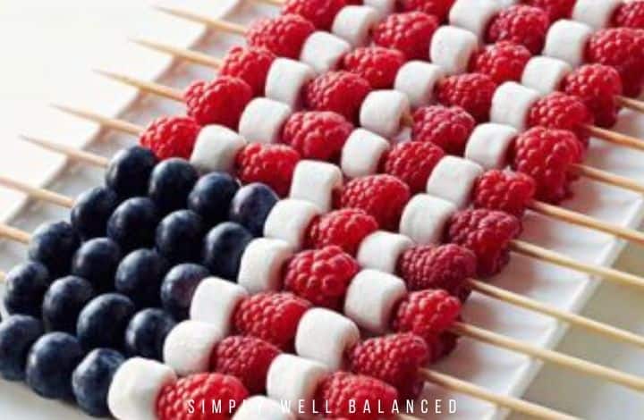 Patriotic Fruit Skewer snack for kids: marshmallows, blueberries and raspberries.