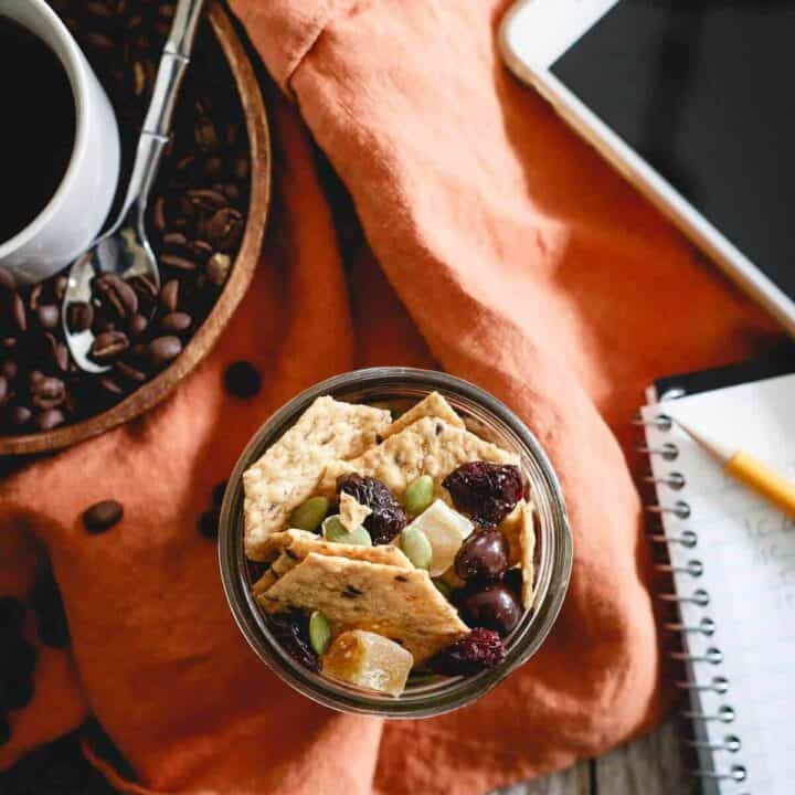 This cracker crunch trail mix has chocolate covered espresso beans in it for a delicious mix of sweet and savory to satisfy any snack craving.