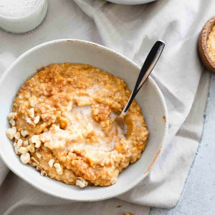 These cozy instant pot sweet potato steel cut oats are filled with golden raisins and warming winter spices. Set it the night before and wake up to a bowl!