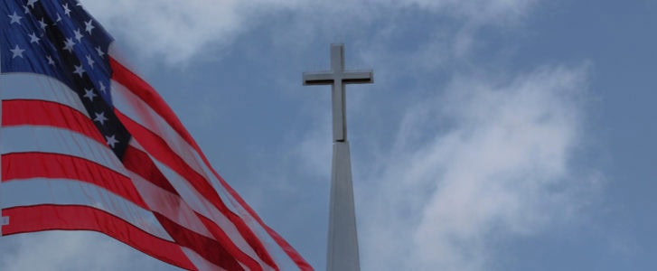 American flag and church steeple