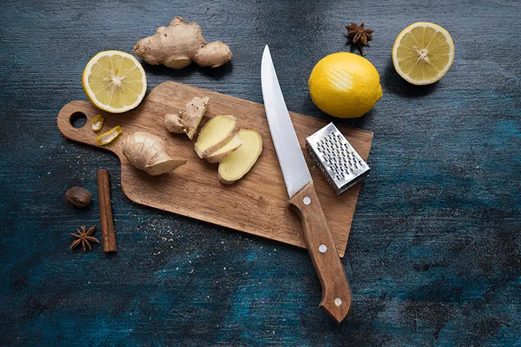 cutting ginger and lemon cutting ginger and lemon