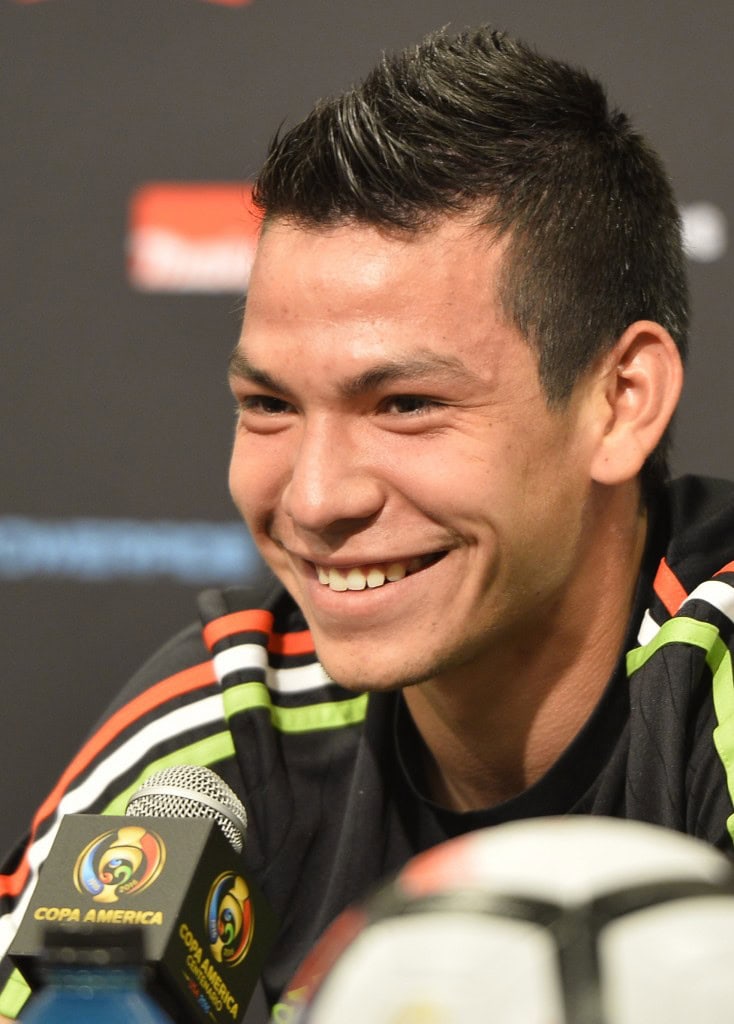 United fans would sporting a similar smile at the prospect of signing the Mexican International. (Picture courtesy Omar Torres /AFP/Getty Images)