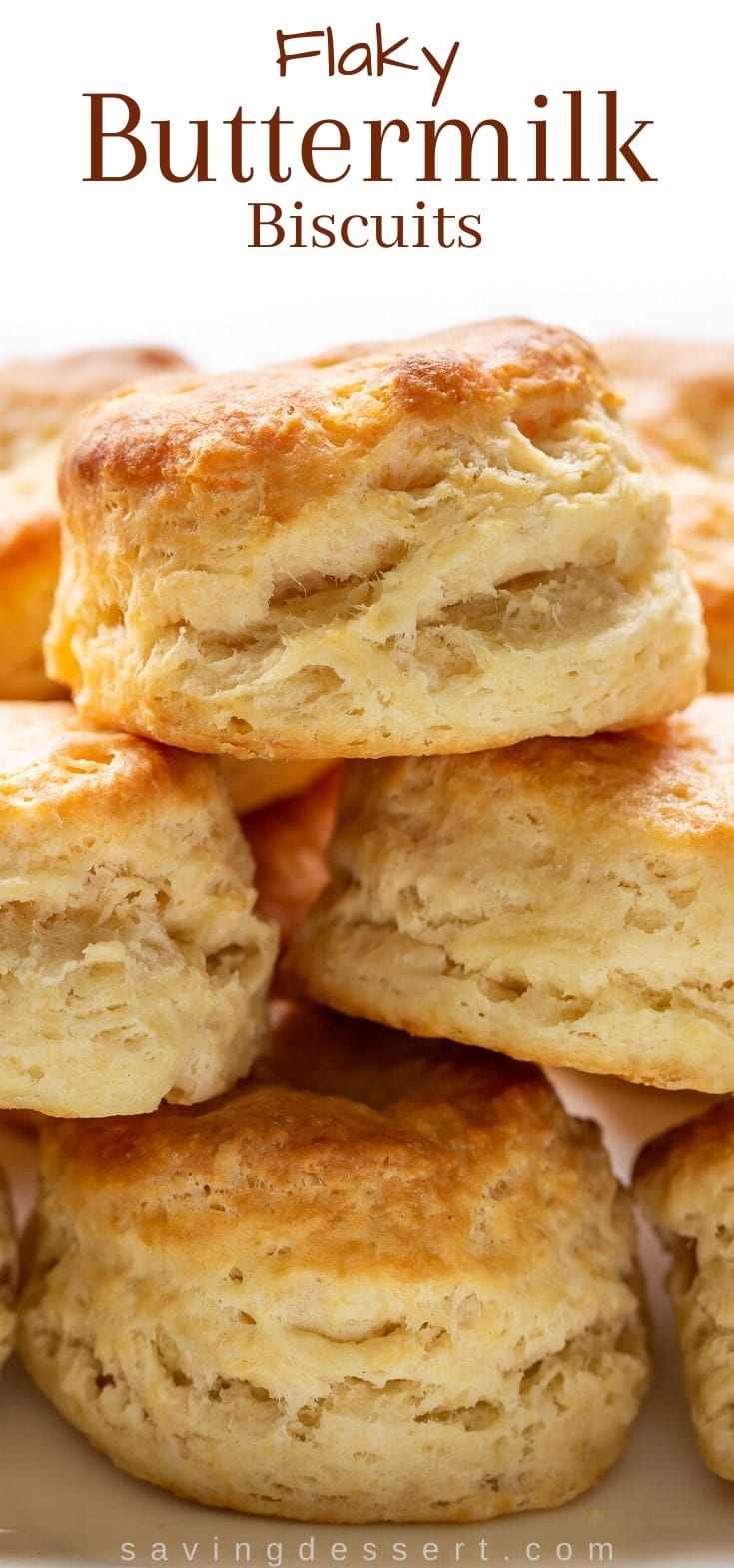 A stack of buttermilk biscuits on a platter