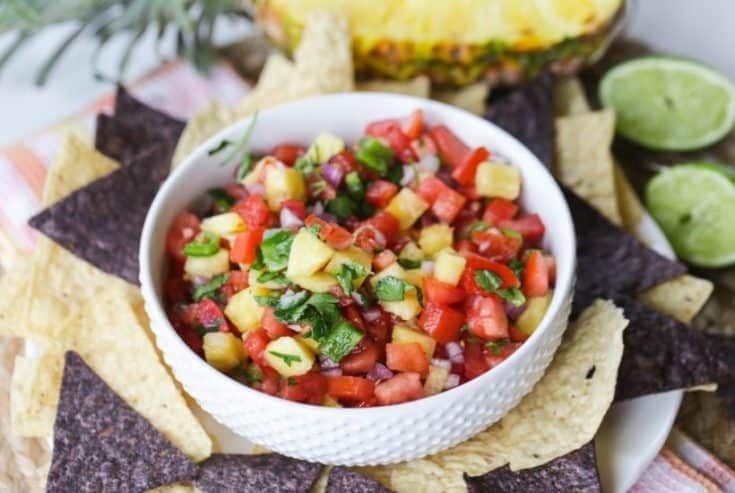 This Pineapple Pico de Gallo is the perfect way to add a sweet and zesty zip to your party. It's the perfect pico de gallo recipe to spice up your summer celebration. #picodegallo #pineapplesalsa #partyrecipe