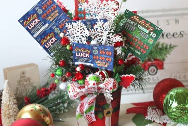 Ring in the holiday season with this easy gift idea. Share some luck this holiday season by giving this DIY New Jersey Lottery Scratch Off Ticket Christmas Arrangement. This is an easy DIY Christmas craft. #ad #BestGifts, #TheGiftThatKeepsOnGiving #NewJerseyLottery #NJLotteryHoliday