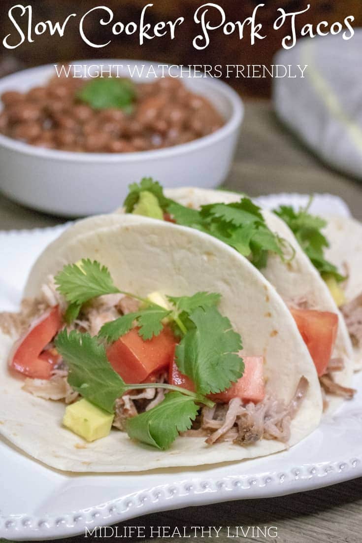 Need a quick and easy weeknight meal that can feed a crowd? These slow cooker pork tacos are a great family dinner recipe. The Crockpot does all the hard work, taco night has never tasted so good!