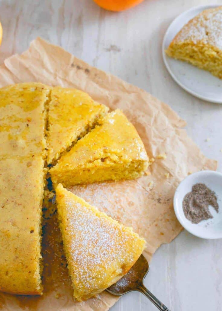 This moist, hearty orange cardamom cake is the perfect with a hot mug of your favorite winter drink is the best way to celebrate this holiday season.