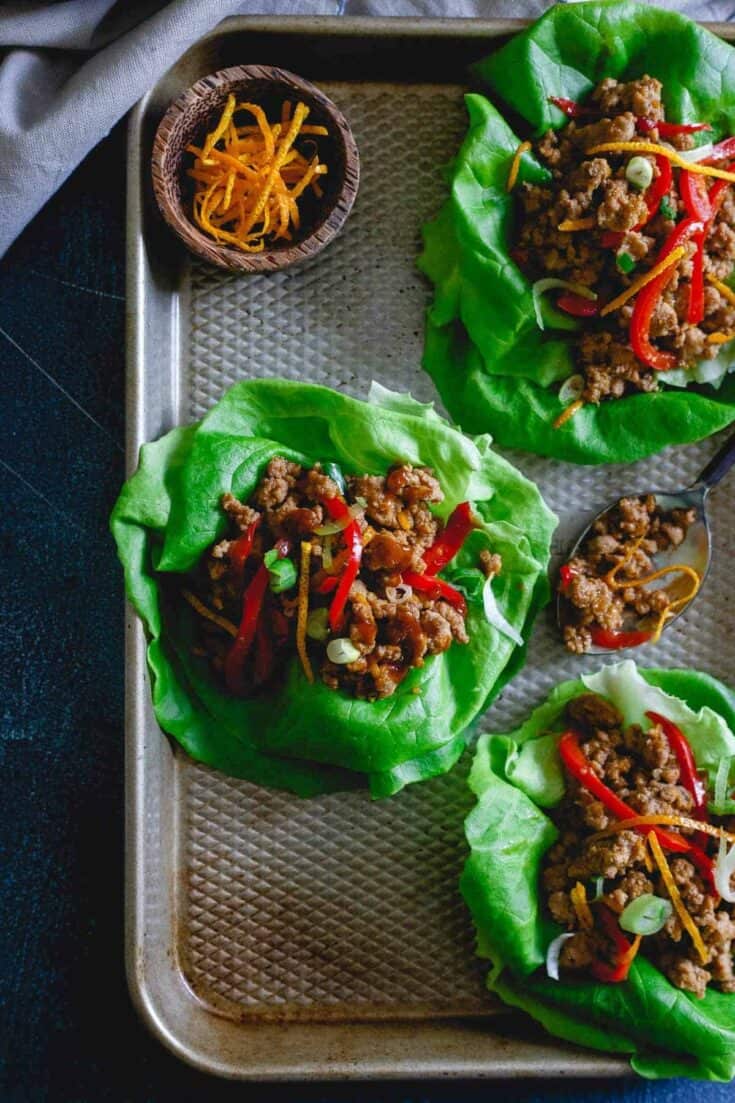These turkey Asian lettuce wraps are infused with a sticky, sweet, savory and slightly spicy orange sauce making them an irresistibly easy and tasty meal.