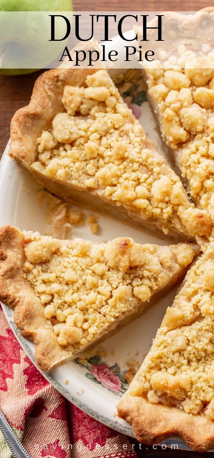 A sliced Dutch apple pie with a crunchy streusel topping