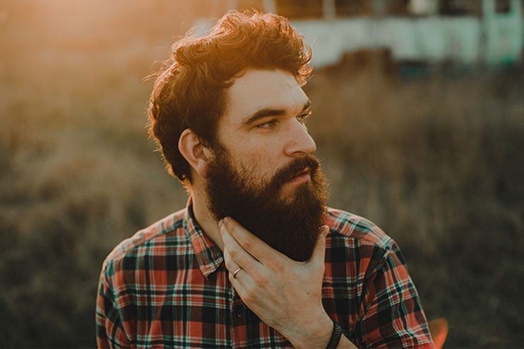 Man Stroking His Beard