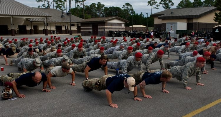 100 pushups a day challenge - U.S. Air Force Airmen participate in memorial pushups during the Tim Davis Memorial March ceremony held at the Special Tactics Training Squadron pavilion on Hurlburt Field, Fla., Oct. 26, 2011. Memorial push-ups are performed to commemorate those who have fallen in combat. (U.S. Air Force photo/Airman 1st Class Christopher Williams)(Released)