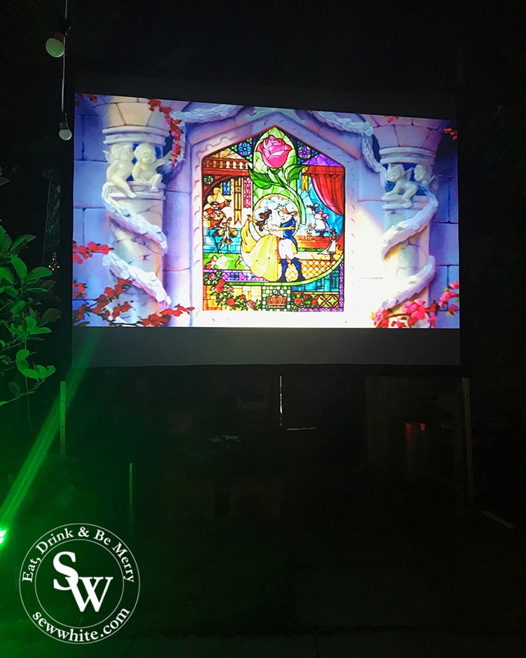 The big movie screen by Essential AV for my Beauty and the Beast Party. Inspiration for our door cinema parties.