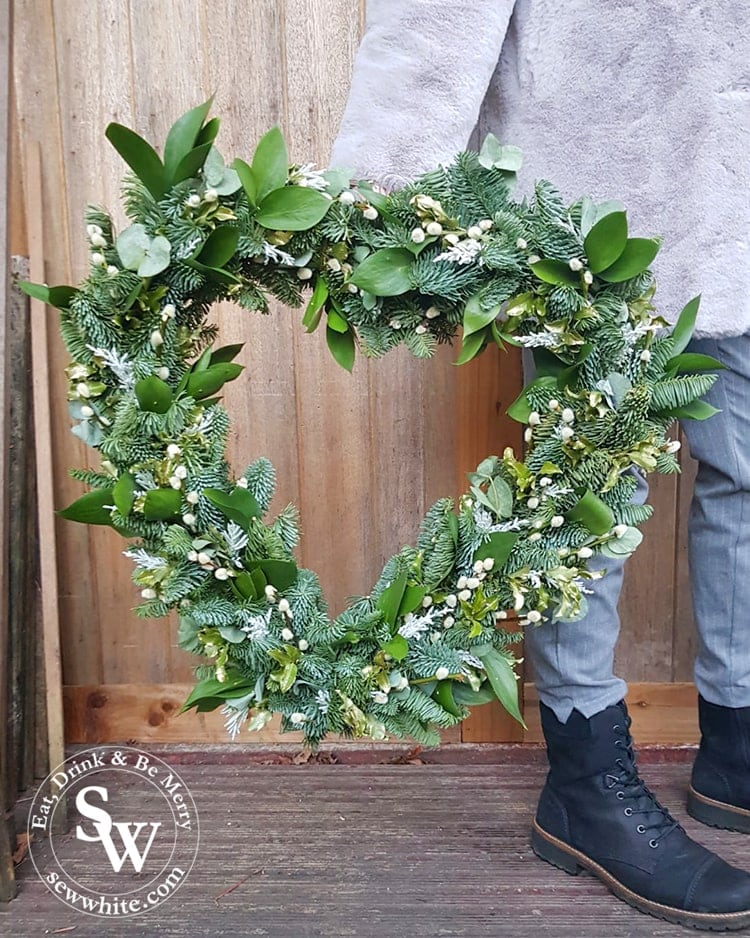 The finished giant heart wreath ready to hand up at Christmas. Studded with golden leaves and pussy willow.