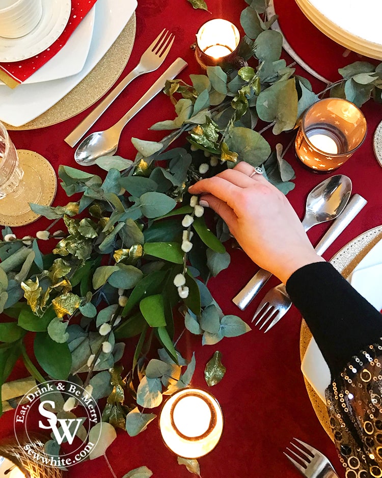 Sisley white adding the final details to the Red Gold and Nature Christmas Table