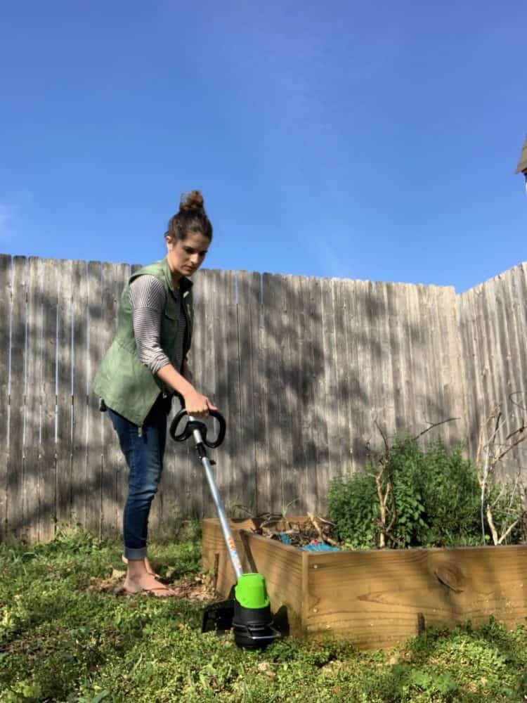woman using a string trimmer