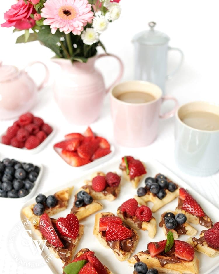 It's a great sweet treat for Afternoon Tea Waffle Bites with nutella and topped with fresh berries.