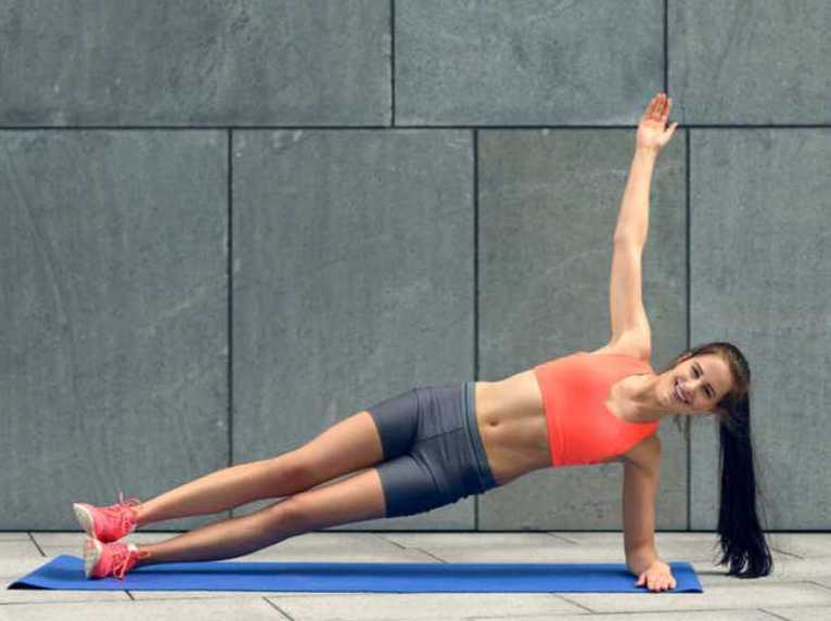 A girl has a training at the gym