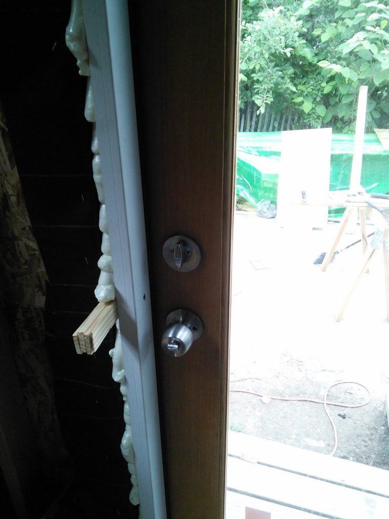 I spray foamed the door opening so we don't have leaks.