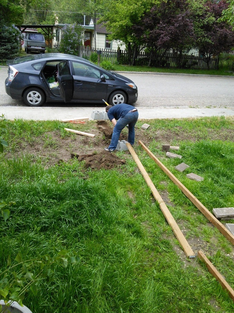 James did a lot of the hard laor digging the holes for the concrete blocks to hold up the bridge over the 'stream'