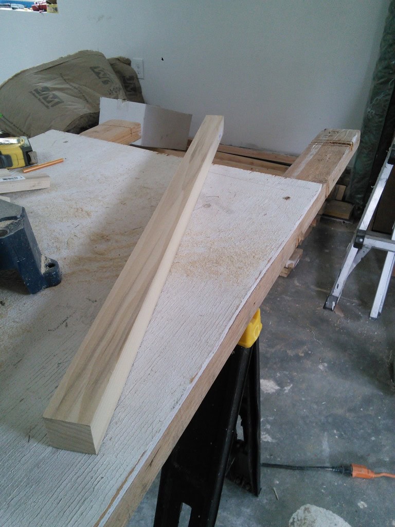 I went to the store on the mission of making toy blocks! I went and looked for blocks and they wanted 3.50 for two plain ole wood blocks... so I went to the Home Depot and got a 2x2 stick of Poplar (a haardish wood that can take a beating), 30 inches long and decided to put the chop saw to work again...