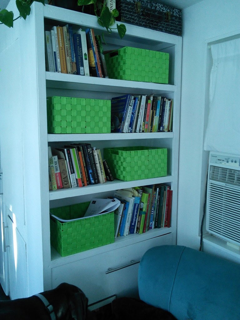 Since this happened though, I can give you a preview of the other housework I've been working on over the weekend, the media center is now just a bookshelf, I bought some chartreuse baskets to keep Hazel's toys in and added an extra bookshelf where the TV was.