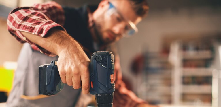 handyman working with a drill