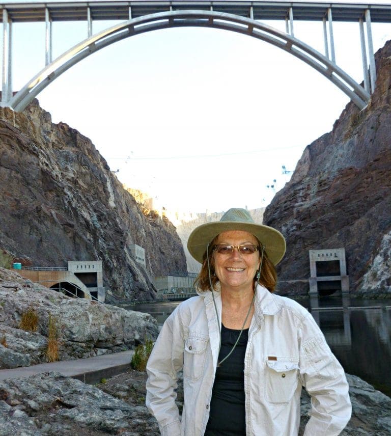 Unstoppable Stacey blocks any view of the Hoover Dam but the bridge is seen above her head