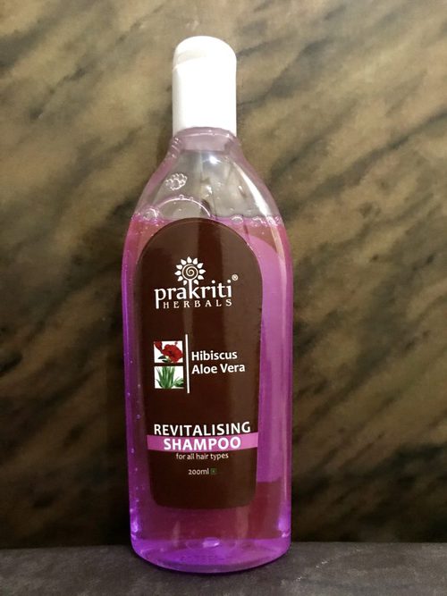 Prakriti Herbals Revitalising shampoo has a basic packaging with nothing fancy. It comes in a transparent recyclable bottle with a nozzle top.