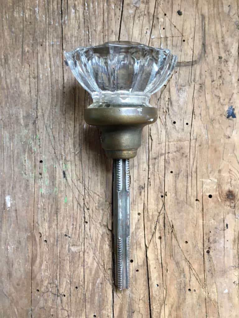 doorknob on wood plank