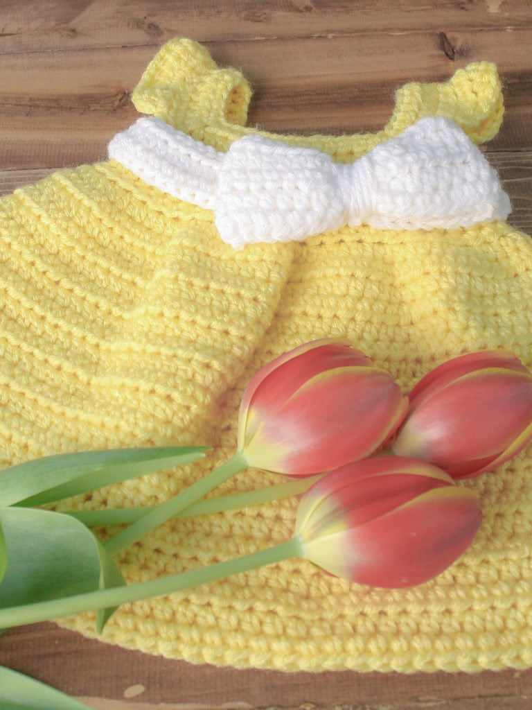 This free baby dress crochet pattern is designed to be quick and simple to create for the beginner or expert crocheters alike. The pattern comes in size newborn through 18 months.