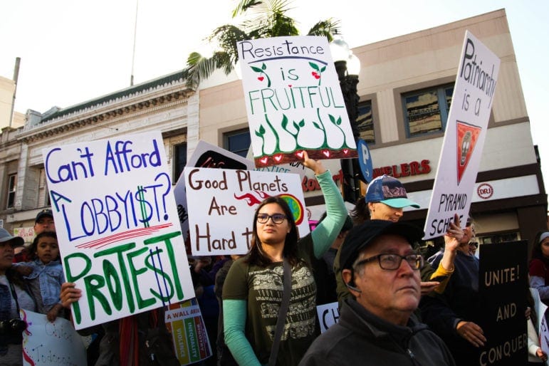 Marchers were creative with their signs.