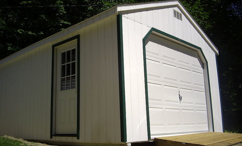 a wooden detached garage