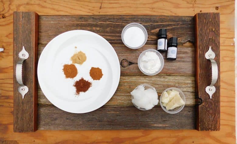 supplies for pumpkin spice deodorant displayed on wooden tray