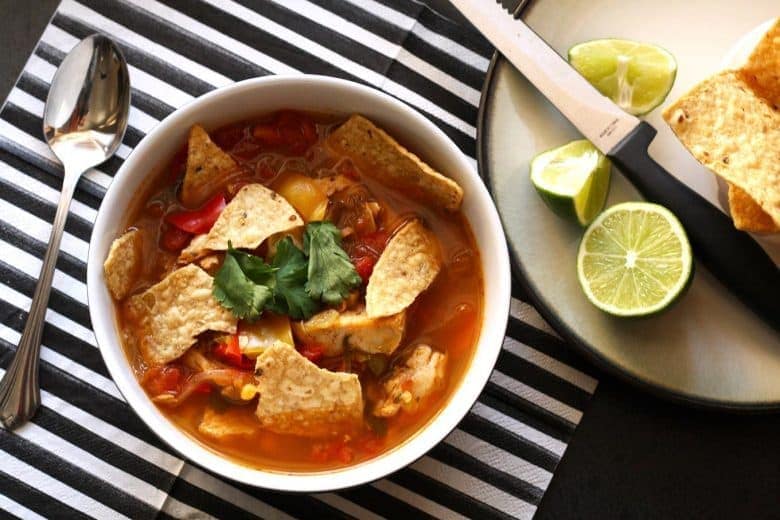 This chicken tortilla soup is easy to make thanks to pre-cooked chicken - you can even use a rotisserie chicken. It is full of vegetables and spice!