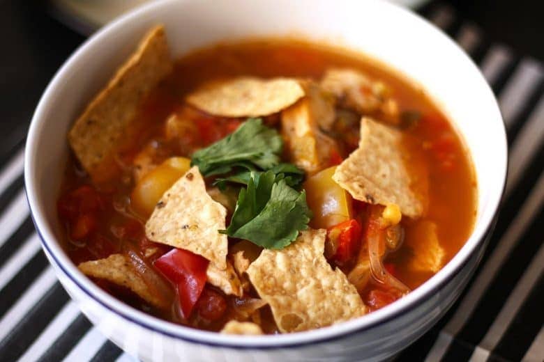 This chicken tortilla soup is easy to make thanks to pre-cooked chicken - you can even use a rotisserie chicken. It is full of vegetables and spice!