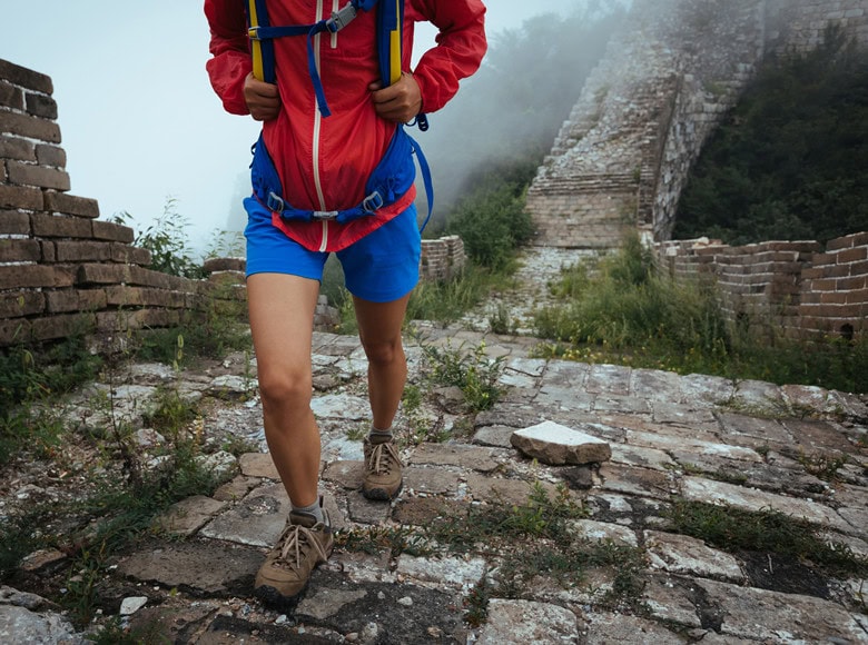 woman tourist walking on the great wall