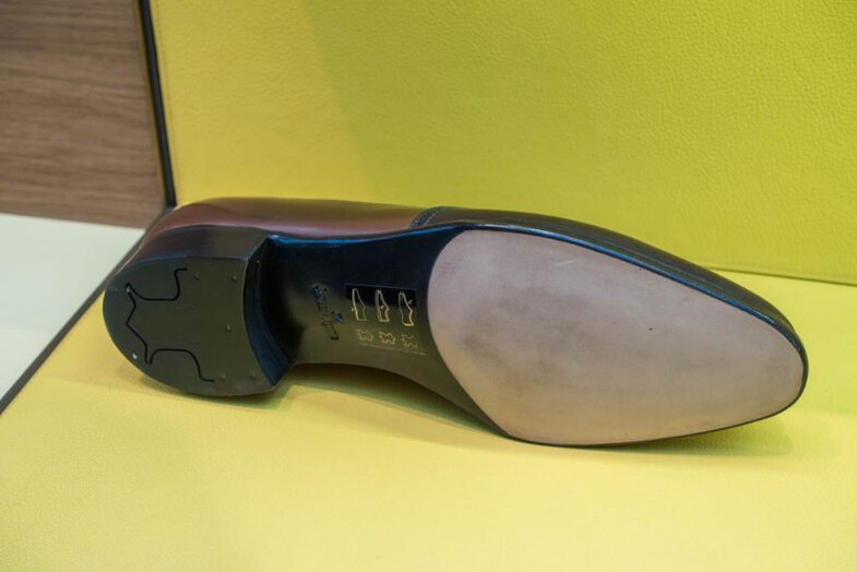 The Prestige shoes has a bevelled waist as opposed to the square waist on the standard range, and also includes lasted shoe trees.