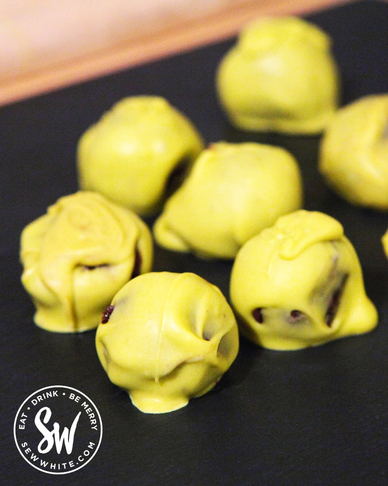 Easy fun Brussels Sprouts Chocolate Truffles. Chocolate truffles dipped in white chocolate dyed green to make them sprouts