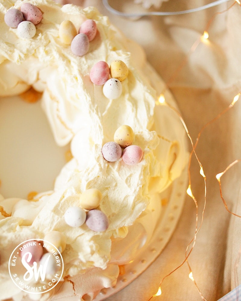 Easter egg pavlova decorated to be a mini egg pavlova