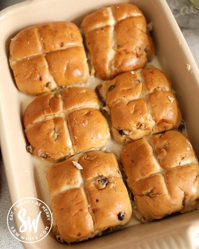 The hot cross buns covered in custard for the hot cross bun pudding