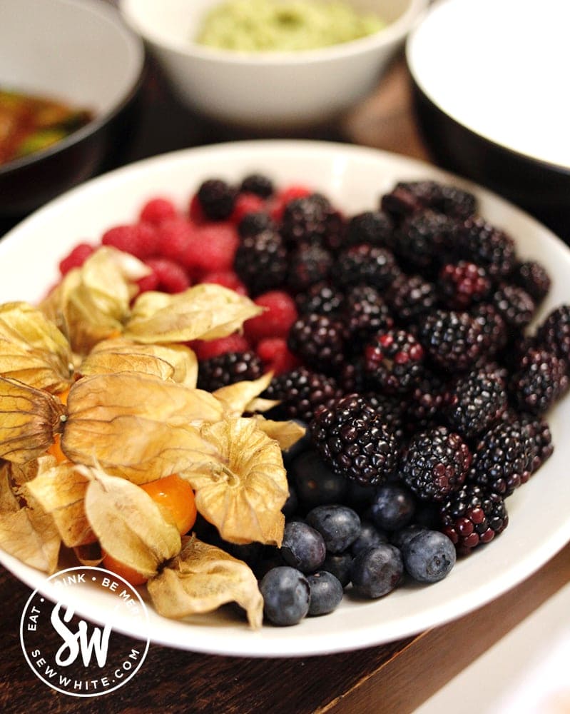 Fresh berries and fruit in a bowl ready for pancake day