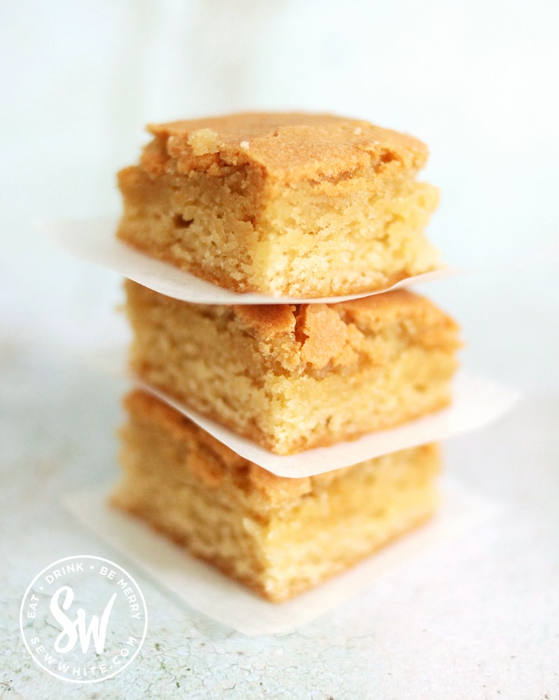 A gorgeous golden stack of a trio of blondies